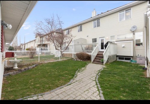 18 West Springs Gate Sw, Calgary, AB - Outdoor With Deck Patio Veranda With Exterior