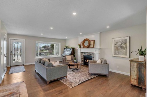37 Highwood Place Nw, Calgary, AB - Indoor Photo Showing Living Room With Fireplace