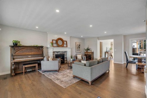 37 Highwood Place Nw, Calgary, AB - Indoor Photo Showing Living Room With Fireplace
