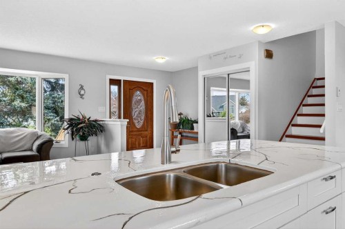117 Bonitz Court, Carseland, AB - Indoor Photo Showing Kitchen With Double Sink