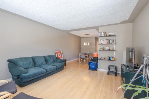 719 27 Avenue Nw, Calgary, AB - Indoor Photo Showing Living Room