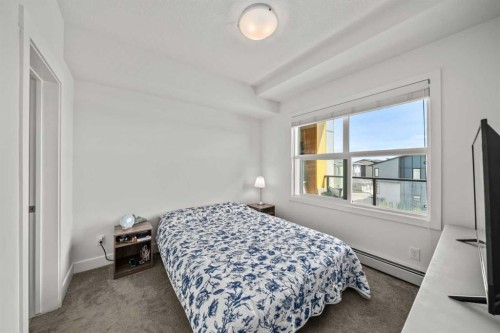 305-19661 40 Street Se, Calgary, AB - Indoor Photo Showing Bedroom