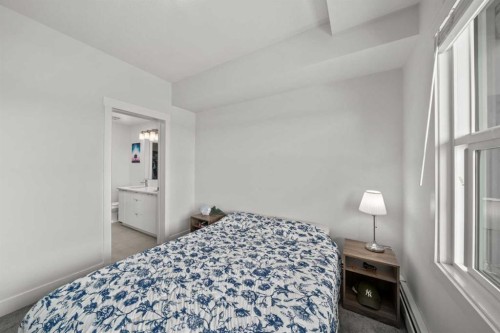 305-19661 40 Street Se, Calgary, AB - Indoor Photo Showing Bedroom