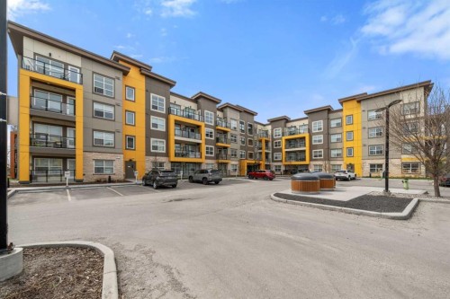305-19661 40 Street Se, Calgary, AB - Outdoor With Balcony With Facade