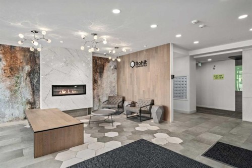 305-19661 40 Street Se, Calgary, AB - Indoor With Fireplace