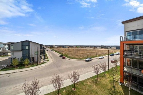 305-19661 40 Street Se, Calgary, AB - Outdoor With Balcony