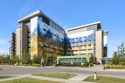 305-19661 40 Street Se, Calgary, AB - Outdoor With Balcony With Facade