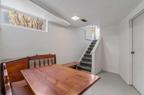 7 Canna Bay Sw, Calgary, AB - Indoor Photo Showing Other Room