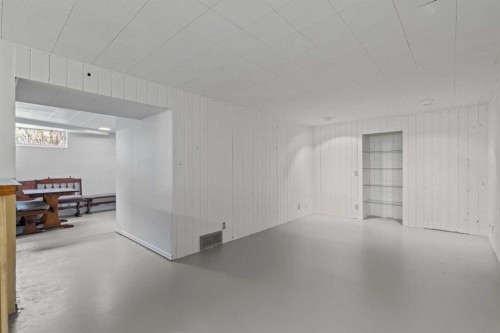 7 Canna Bay Sw, Calgary, AB - Indoor Photo Showing Other Room