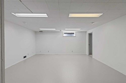 7 Canna Bay Sw, Calgary, AB - Indoor Photo Showing Other Room