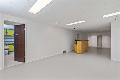 7 Canna Bay Sw, Calgary, AB - Indoor Photo Showing Other Room