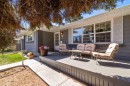 7 Canna Bay Sw, Calgary, AB  - Outdoor With Deck Patio Veranda 