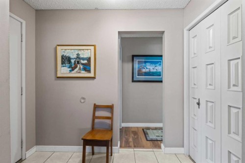 7 Canna Bay Sw, Calgary, AB - Indoor Photo Showing Other Room