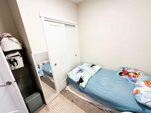 205-700 Shawnee Square Sw, Calgary, AB - Indoor Photo Showing Bedroom