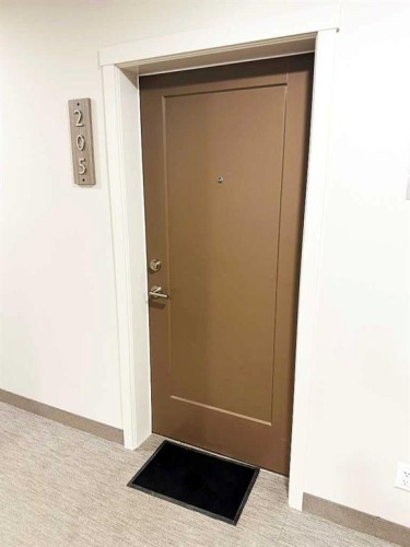205-700 Shawnee Square Sw, Calgary, AB - Indoor Photo Showing Other Room