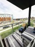 205-700 Shawnee Square Sw, Calgary, AB  - Outdoor With Balcony With Exterior 
