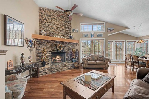 183 Discovery Ridge Way Sw, Calgary, AB - Indoor Photo Showing Living Room With Fireplace