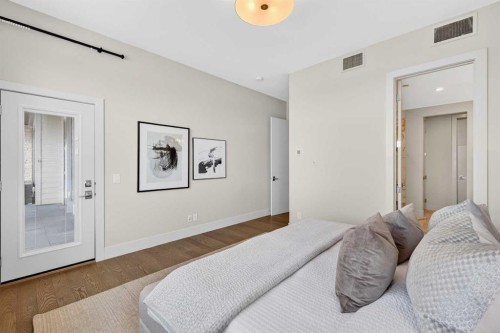 101-23 Mahogany Circle Se, Calgary, AB - Indoor Photo Showing Bedroom