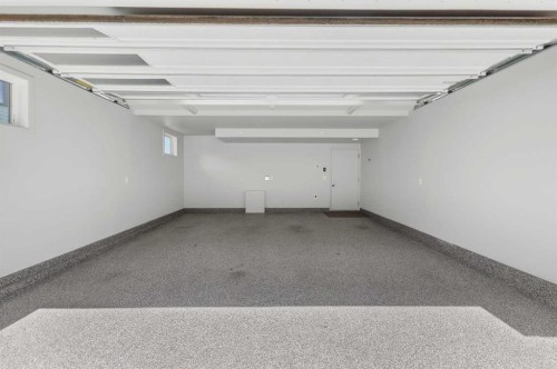 101-23 Mahogany Circle Se, Calgary, AB - Indoor Photo Showing Garage