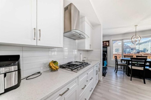 2004 Ravensdun Crescent Se, Airdrie, AB - Indoor Photo Showing Kitchen With Upgraded Kitchen