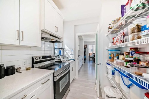 2004 Ravensdun Crescent Se, Airdrie, AB - Indoor Photo Showing Kitchen