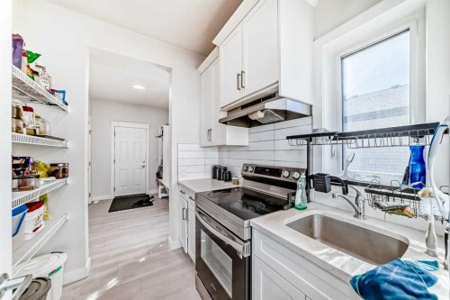2004 Ravensdun Crescent Se, Airdrie, AB - Indoor Photo Showing Kitchen