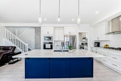 2004 Ravensdun Crescent Se, Airdrie, AB - Indoor Photo Showing Kitchen With Stainless Steel Kitchen With Upgraded Kitchen