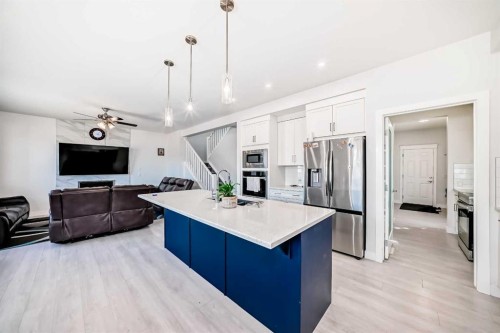 2004 Ravensdun Crescent Se, Airdrie, AB - Indoor Photo Showing Kitchen With Stainless Steel Kitchen With Upgraded Kitchen