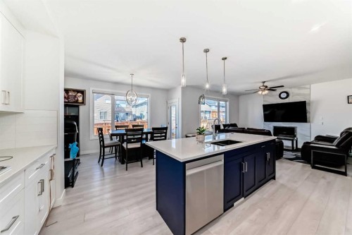 2004 Ravensdun Crescent Se, Airdrie, AB - Indoor Photo Showing Kitchen With Double Sink With Upgraded Kitchen