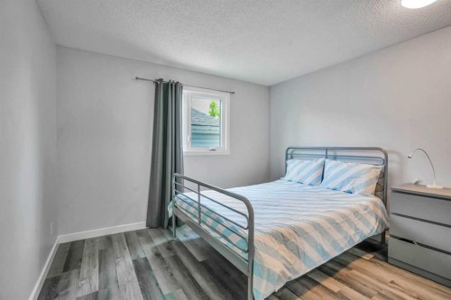 76 Aberfoyle Close Ne, Calgary, AB - Indoor Photo Showing Bedroom