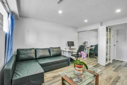 76 Aberfoyle Close Ne, Calgary, AB - Indoor Photo Showing Other Room