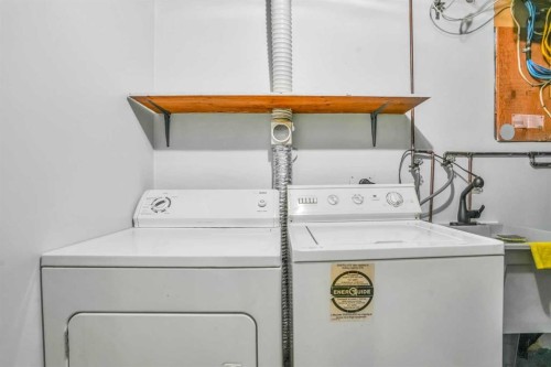 76 Aberfoyle Close Ne, Calgary, AB - Indoor Photo Showing Laundry Room