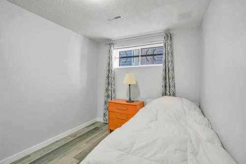 76 Aberfoyle Close Ne, Calgary, AB - Indoor Photo Showing Bedroom