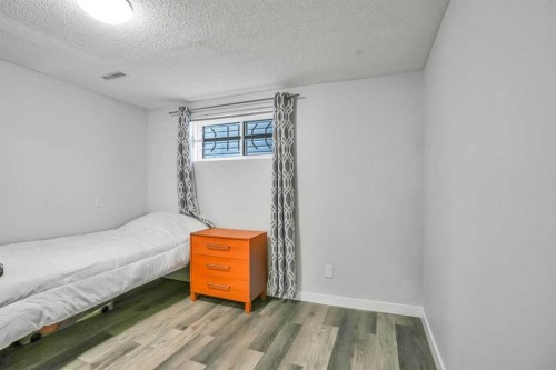 76 Aberfoyle Close Ne, Calgary, AB - Indoor Photo Showing Bedroom
