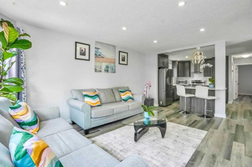 76 Aberfoyle Close Ne, Calgary, AB - Indoor Photo Showing Living Room