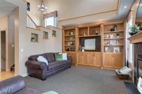 195 Willowmere Close, Chestermere, AB - Indoor Photo Showing Other Room With Fireplace