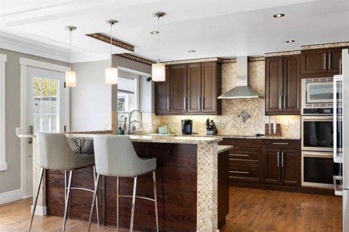 1030 Mckenzie Lake Bay Se, Calgary, AB - Indoor Photo Showing Kitchen With Upgraded Kitchen