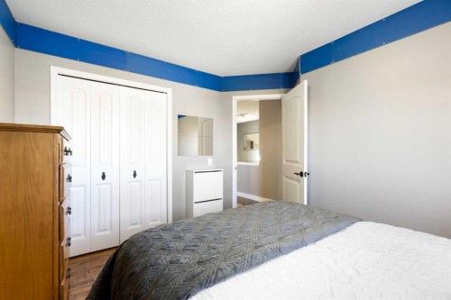 1030 Mckenzie Lake Bay Se, Calgary, AB - Indoor Photo Showing Bedroom