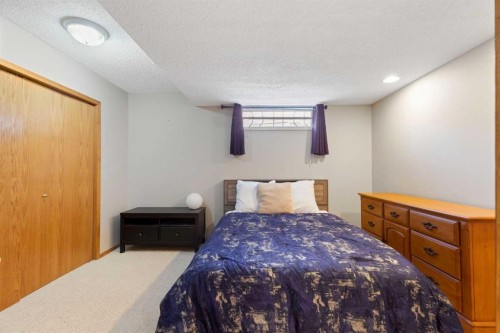 1030 Mckenzie Lake Bay Se, Calgary, AB - Indoor Photo Showing Bedroom