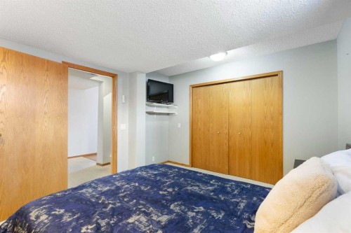 1030 Mckenzie Lake Bay Se, Calgary, AB - Indoor Photo Showing Bedroom
