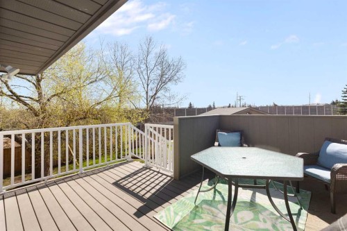 1030 Mckenzie Lake Bay Se, Calgary, AB - Outdoor With Deck Patio Veranda With Exterior