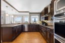 1030 Mckenzie Lake Bay Se, Calgary, AB  - Indoor Photo Showing Kitchen With Upgraded Kitchen 