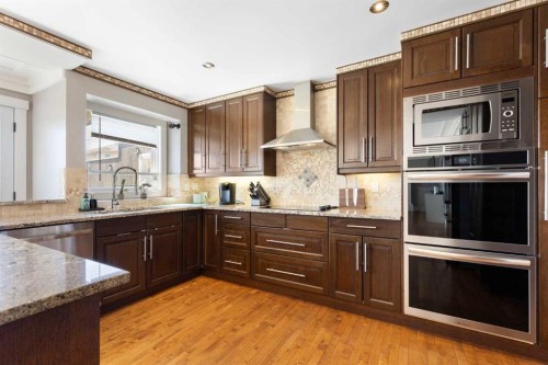 1030 Mckenzie Lake Bay Se, Calgary, AB - Indoor Photo Showing Kitchen With Upgraded Kitchen