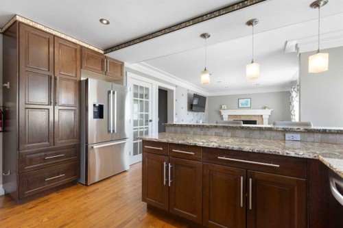 1030 Mckenzie Lake Bay Se, Calgary, AB - Indoor Photo Showing Kitchen With Upgraded Kitchen