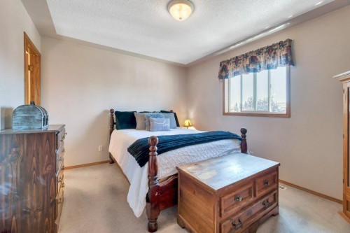 7 Springs Crescent Se, Airdrie, AB - Indoor Photo Showing Bedroom