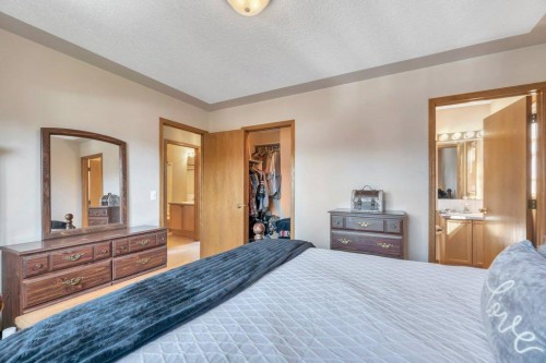 7 Springs Crescent Se, Airdrie, AB - Indoor Photo Showing Bedroom