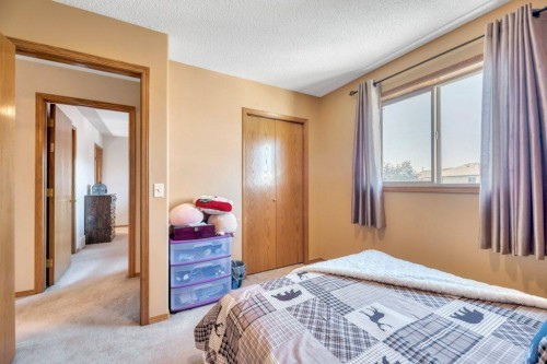 7 Springs Crescent Se, Airdrie, AB - Indoor Photo Showing Bedroom