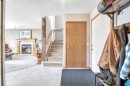 7 Springs Crescent Se, Airdrie, AB  - Indoor Photo Showing Other Room With Fireplace 
