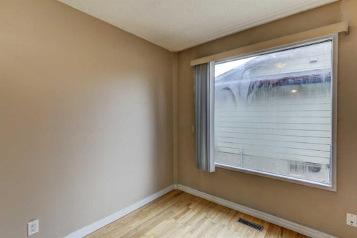 1163 Falworth Road Ne, Calgary, AB - Indoor Photo Showing Other Room