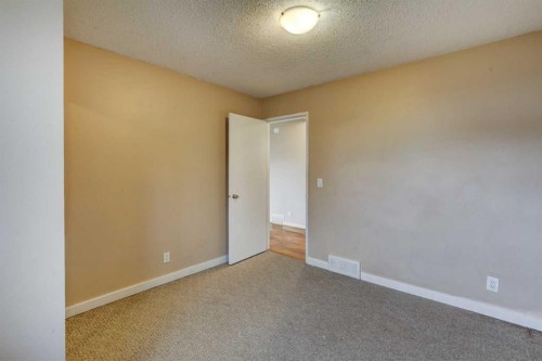 1163 Falworth Road Ne, Calgary, AB - Indoor Photo Showing Other Room